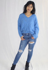 blue v-neck long sleeve sweater
