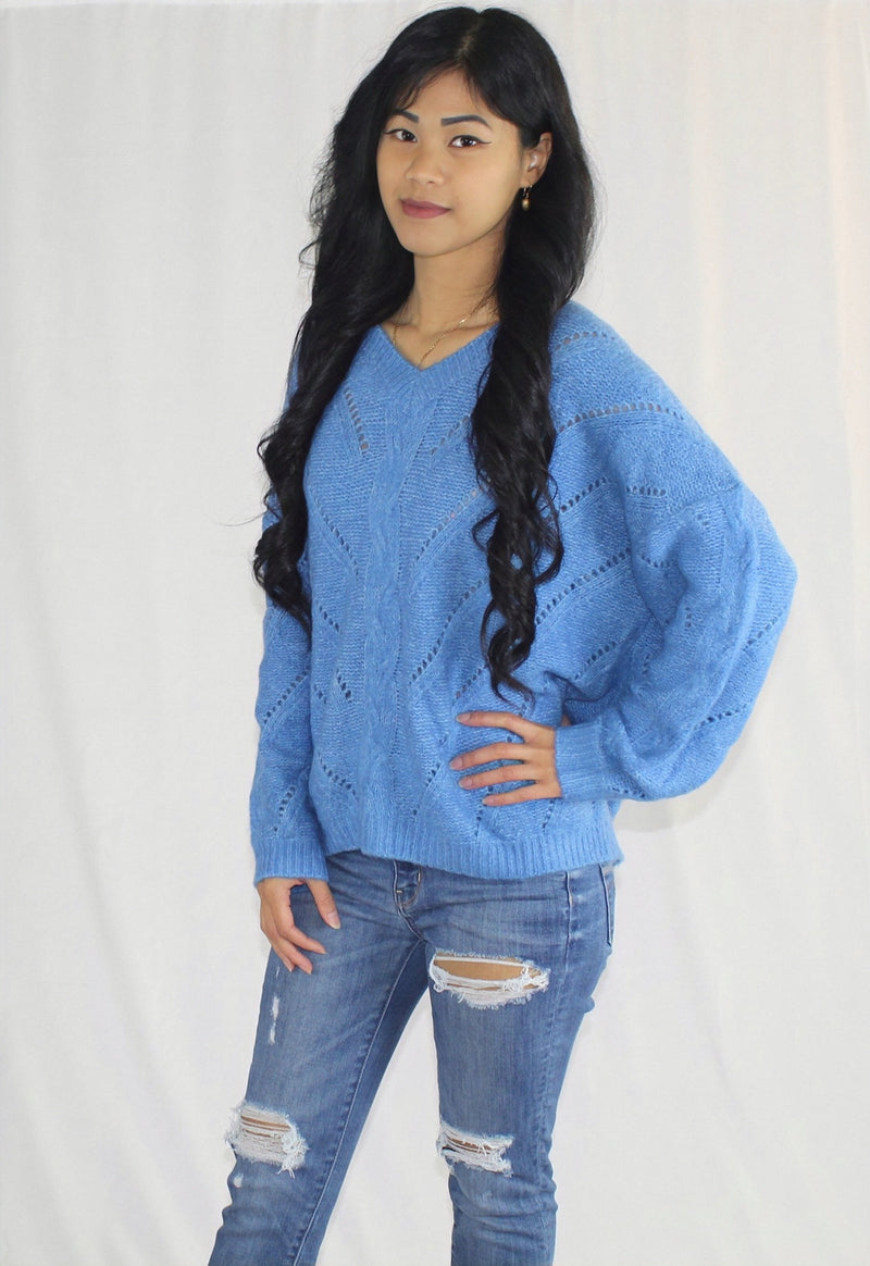 blue v-neck long sleeve sweater